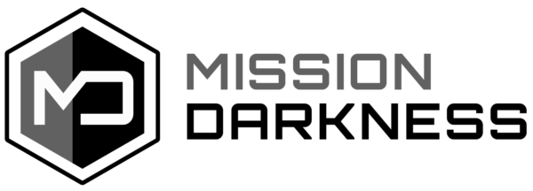 A black background with the words mission dark written in silver.